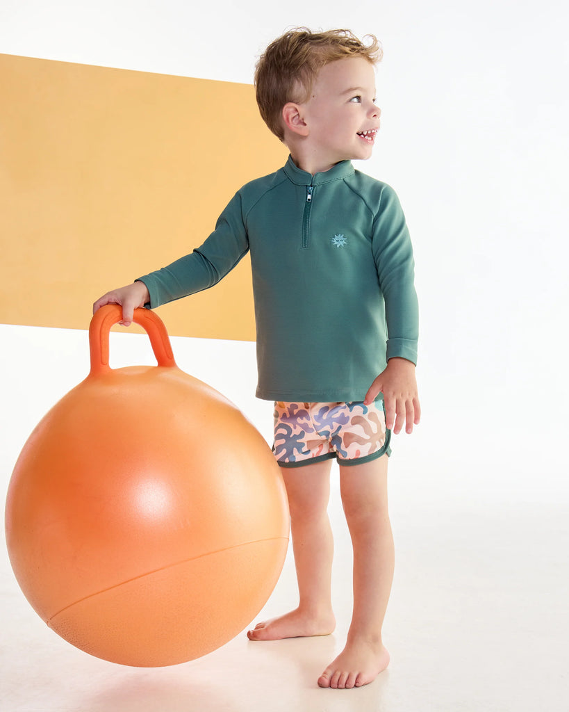 Coral Swim Trunks